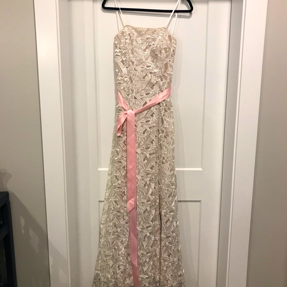 Beautiful full length cream evening gown.